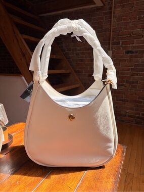 kate spade Cream Pebbled Leather Shoulder Bag with Gold Spade Accent